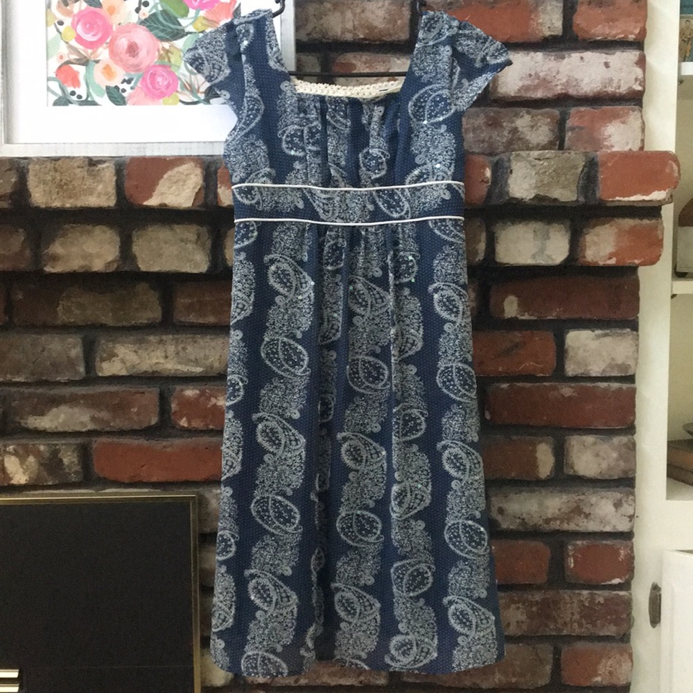 Girl’s dark blue dress